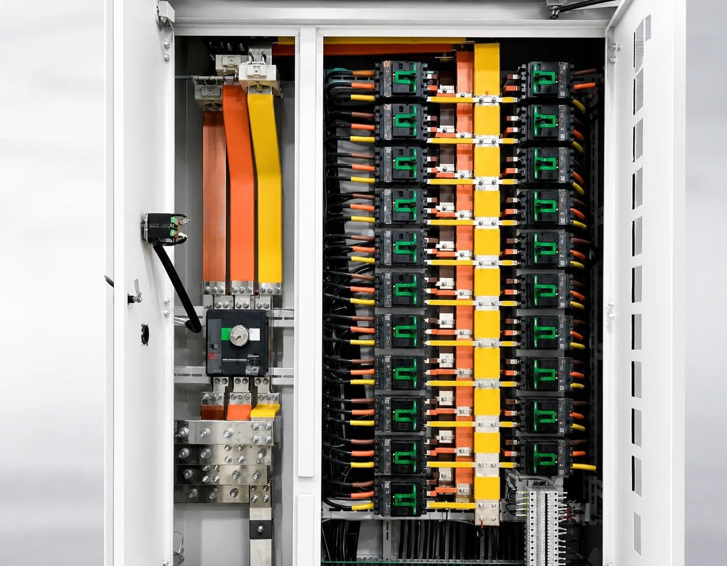 Busbar and per-branch breaker power distribution inside the container