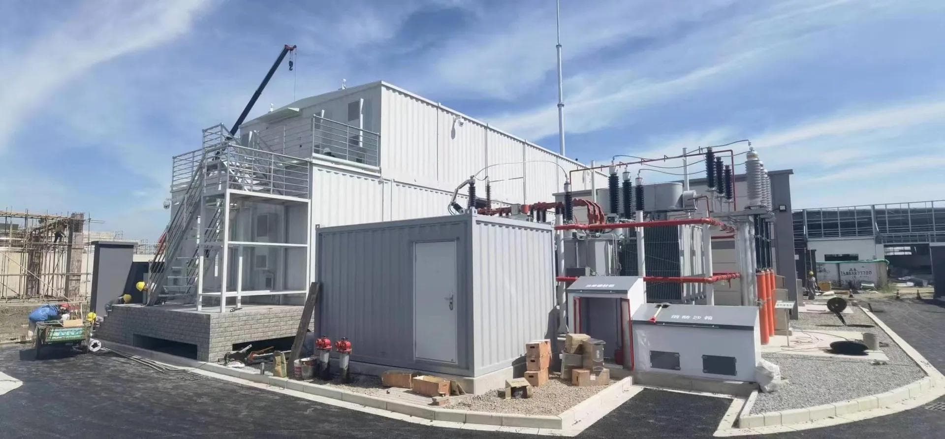 Prefabricated substation module being lifted into position on site